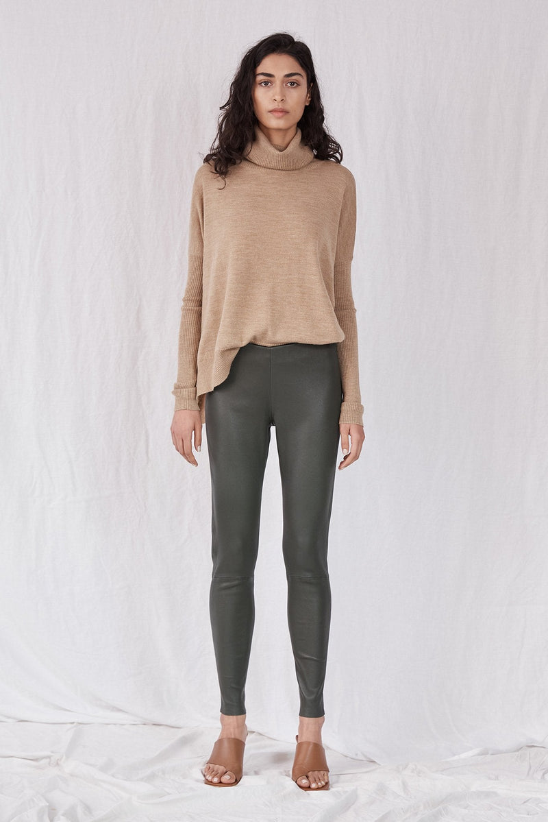 https://www.ourcommonplace.co/cdn/shop/products/West14th-Designer-Leather-Clothing-West-Broadway-Stretch-Leather-Legging-Dark-Green-Leather-Deep-Depths-Leather201202_W14TH_AW21_11_1605_800x.jpg?v=1649711253